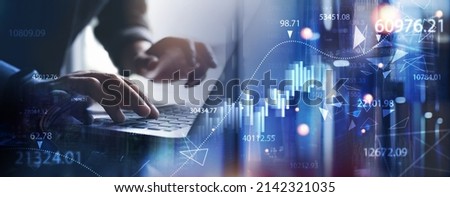 Digital technology, big data, business finance and investment with innovative futuristic technology background. Business man using digital tablet with financial graph growth chart, data science