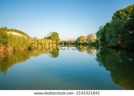 Boat ride on the calm river. It is a popular place and holiday destination on the Göksu river. Reflection of trees. Reflections in the water.
Agva, Sile, Istanbul, Turkey.