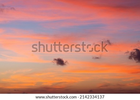 Orange sunset sky with clouds. Beautiful landscape, sunrise. High quality photo
