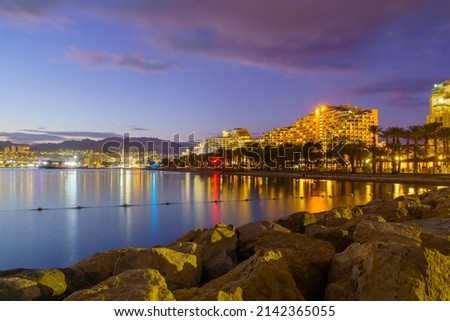Winter evening view of the promenade, with hotel buildings. Eilat, southern Israel