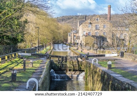 The Rochdale canal locks at Hebden Bridge in Calder dale Royalty-Free Stock Photo #2142407729