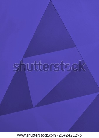 Colored paper mosaic background with copy space. Bicolor very peri background
