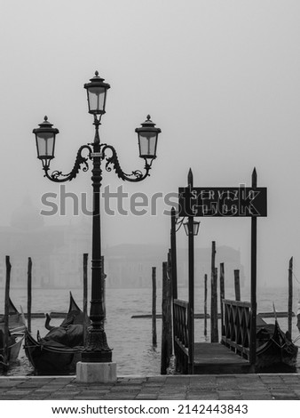 black and white photographs of Venice shrouded in fog