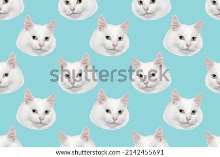 Funny cat's heads on blue background. Seamless repeating pattern. Digital collage. Royalty-Free Stock Photo #2142455691