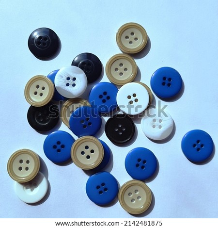 Amazing colorful buttons, fashion clothes with buttons, tailoring photo 