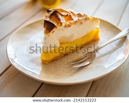 Lemon tart on wooden table 