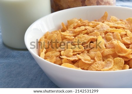 Cornflakes in a white bowl.  