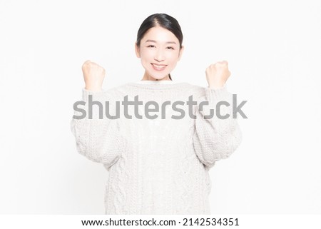 A smiling woman who is happy to do a guts pose