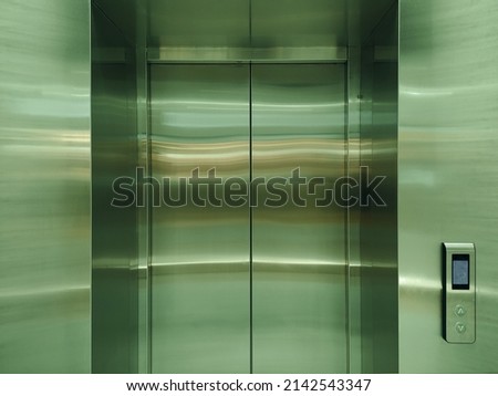 Chrome elevator with closed doors, business center elevator doors, metal doors, chrome gradient, brushed metal texture, closed doors , stainless steel, closed metal door detail, interior 