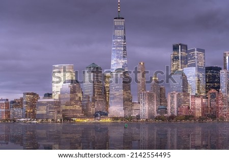 Long Exposure night Manhattan skyline with reflection on the Hudson