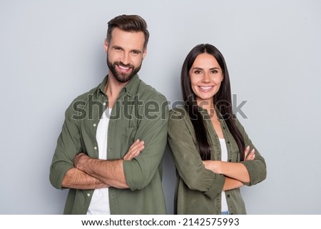 Photo of young cheerful husband wife folded hands marriage romance isolated over grey color background