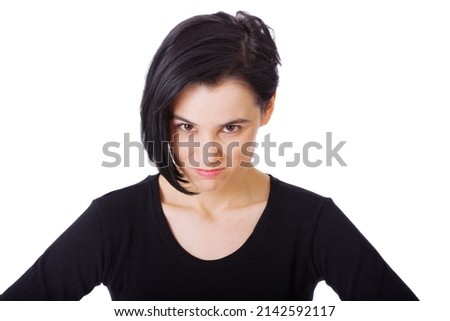 Shes got fire in her belly. Portrait of an attractive young woman showing aggression against a white backgtound. Royalty-Free Stock Photo #2142592117