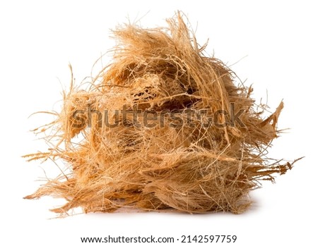 pile of coconut husk fiber or coir, commercially important natural fiber extracted from outer husk of coconut fruit,isolated on white background Royalty-Free Stock Photo #2142597759