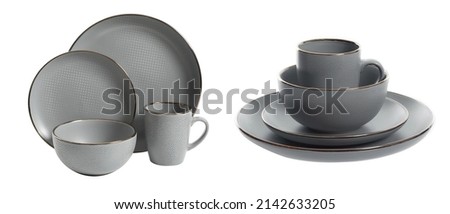 close up view of nice cookware set on white background, kitchenware set. Grey cookware set, Teacup Set Royalty-Free Stock Photo #2142633205