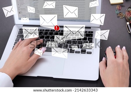 Laptop, hands on keyboard and email icons with PHISHING ALERT warning scam, spam, malware, spyware. Information poster. High quality photo Royalty-Free Stock Photo #2142633343