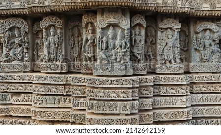 Stone Sculpture of Indian Lords Krishna, Vishnu, Lord Bramha on the Lakshminarsimha Temple, Javagal , Hassan, Karnataka, India Royalty-Free Stock Photo #2142642159
