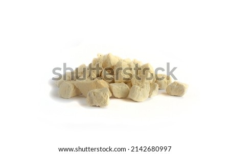 Freeze Dried Chicken Pieces in Pile Isolated on White Royalty-Free Stock Photo #2142680997