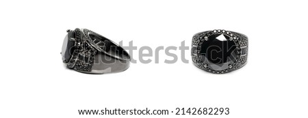 Blackened silver ring with black Spinel on white background with reflection. Collection of natural gemstones accessories. Studio shot Royalty-Free Stock Photo #2142682293