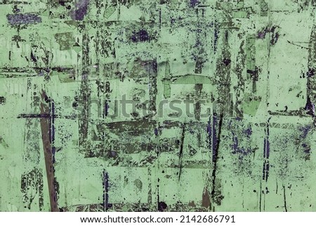 Detail of old rusty and abandoned metal wall, vandalism