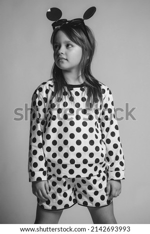 Beautiful and fashionable child girl. High quality photo