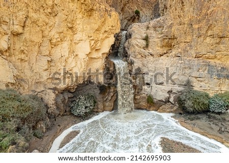 The famous biblical stream Kidron. Ancient mountains around the Dead Sea. The picture was taken by a drone. Winter flood on the Kidron stream. Cold rainy winter in Israel. 