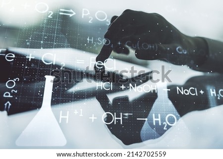 Double exposure of creative chemistry concept with finger clicks on a digital tablet on background, research and development concept Royalty-Free Stock Photo #2142702559