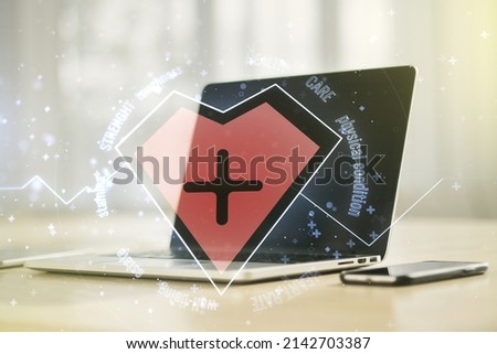 Creative abstract heart rate sketch on modern laptop background, Medicine and healthcare concept. Multiexposure