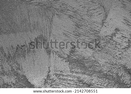 Texture of gray decorative plaster or concrete. Abstract grunge background for design. Royalty-Free Stock Photo #2142708551