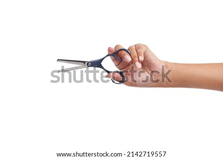 Time for a new hairstyle. Cropped shot of a woman holding a pair of haircutting scissors. Royalty-Free Stock Photo #2142719557