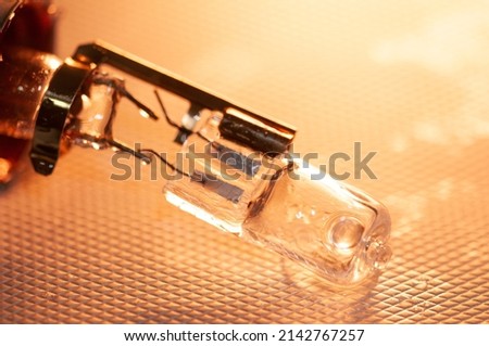 Close up of an electric bulb isolated in background with pattern, Transparent realistic light bulb isolated with fine details and high resolution