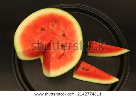 Closeup of Slices of Water Melon with black background