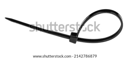 Black plastic cable ties isolated on white background. plastic wire ties closeup. Royalty-Free Stock Photo #2142786879