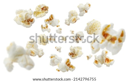 Flying popcorn, isolated on white background Royalty-Free Stock Photo #2142796755