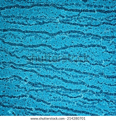 Blue sand texture close up. Wavy nature pattern detail. Marble pattern.