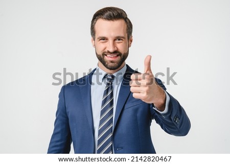 Successful rich confident young businessman ceo manager boss in formal suit wear showing thumb up isolated in white background. Royalty-Free Stock Photo #2142820467