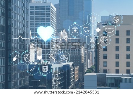 Panorama cityscape of Los Angeles downtown at day time, California, USA. Skyscrapers of LA city. Hologram healthcare digital medicine icons. The concept of treatment from disease, Threat of pandemic