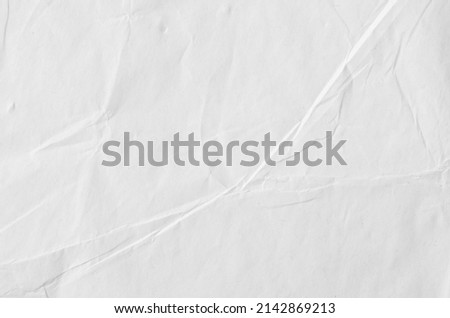 Creative background with scattered overlay of crumpled papers. Royalty-Free Stock Photo #2142869213