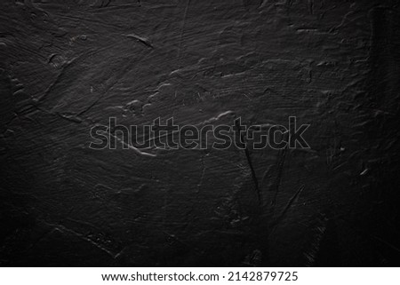 Black wall texture for background, dark concrete or cement floor old black with elegant vintage distressed grunge texture and dark gray charcoal color paint