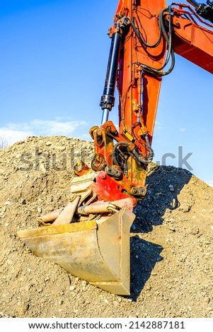 typical excavator at a construction site - photo