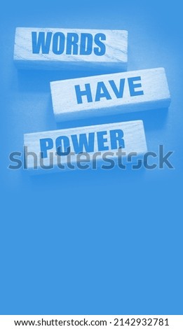 Words Have Power - text on wooden blocks on dark grey background. Powerfull force of communication, storytelling business concept.