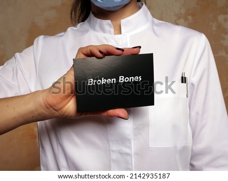 Healthcare concept meaning Broken Bones with inscription on the page.
