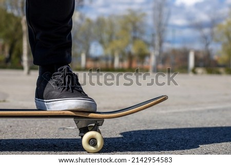 Close-up of a foot on a skateboard 