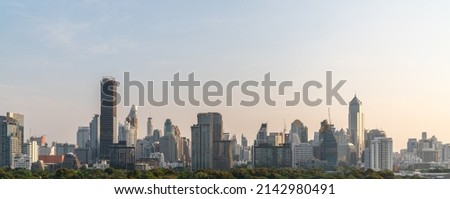 Cityscape and high-rise buildings in metropolis city center . Downtown business district in panoramic view . Royalty-Free Stock Photo #2142980491