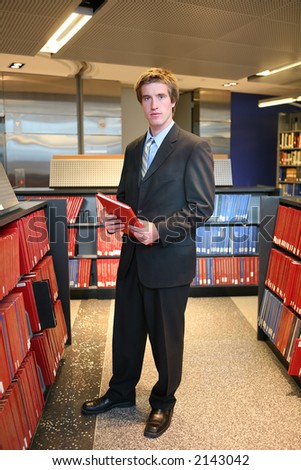 A lawyer in the library preparing for a case