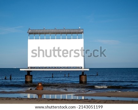 Advertising banner on the background of the sea. billboard on the background of the sea. Royalty-Free Stock Photo #2143051199