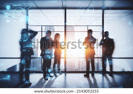 Backlit business people working tohether in abstract creative blurry office interior with business charts and binary code. System engineering and digital transformation concept. Double exposure