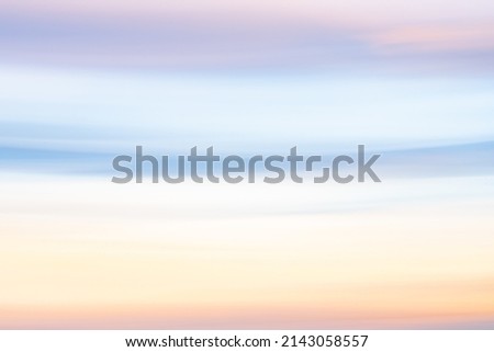 Sunset sky colors background in soft shades pink,blue and yellow. Royalty-Free Stock Photo #2143058557