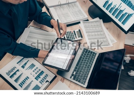 Investors working on desk office and use tablet to  check tracking cost. Accounting and  Financial concept. Royalty-Free Stock Photo #2143100689