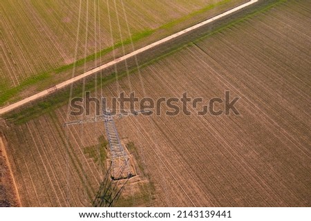 Aerial view of power lines that are necessary for the energy transition