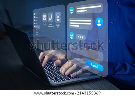 Chatbot conversation. Person using online customer service with chat bot to get support. Artificial intelligence and CRM software automation technology. Virtual assistant on internet. Royalty-Free Stock Photo #2143155369